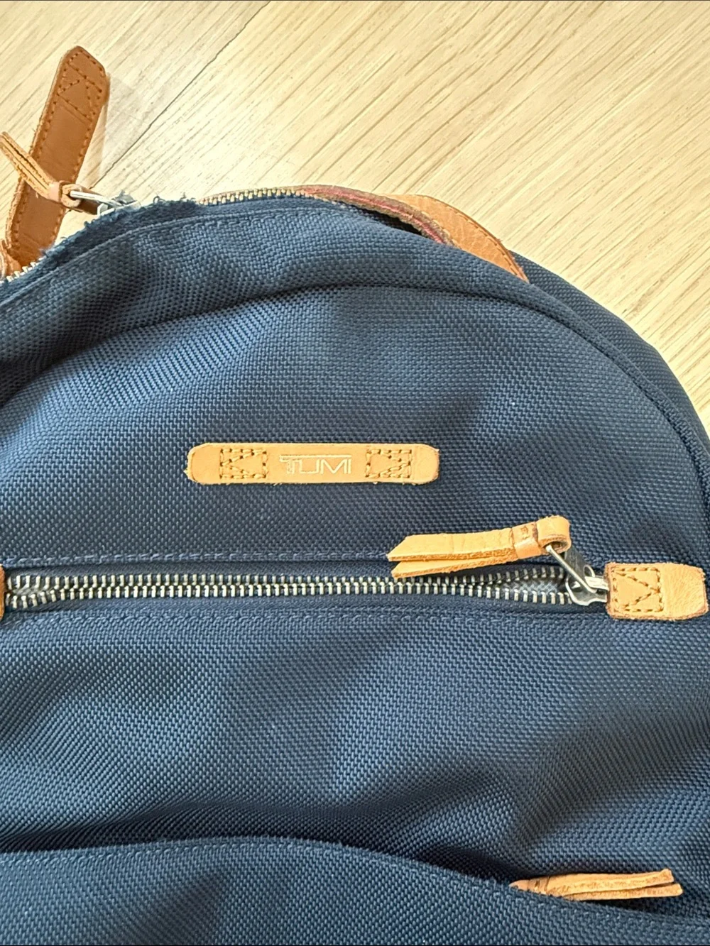 Tumi Navy and Gray Backpack with Tan Accents